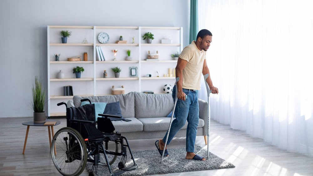 rehabilitation-concept-young-black-guy-walking-wi-2022-10-07-02-49-34-utc